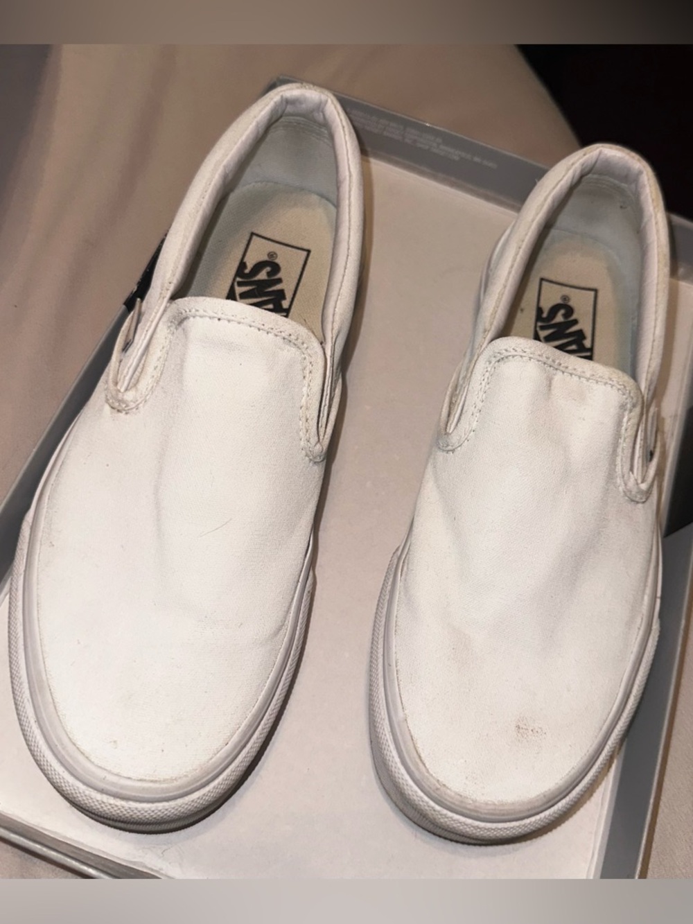 Vans White Canvas Slip-On Sneakers